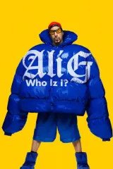 Ali G: Who Iz I? (2026) movie poster featuring Sacha Baron Cohen as Ali G in signature yellow tracksuit and sunglasses