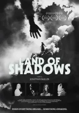 Land of Shadows (2026) movie poster featuring Sandy Lakdar as Alice Chevalier in a surreal, foggy landscape with fractured clock motifs