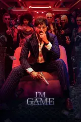 I'm Game (2026) movie poster featuring Dulquer Salmaan as a charismatic gambler amid neon-lit casino and action elements