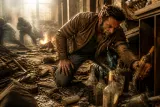 Marvel's Wolverine in action, searching for whiskey bottles.