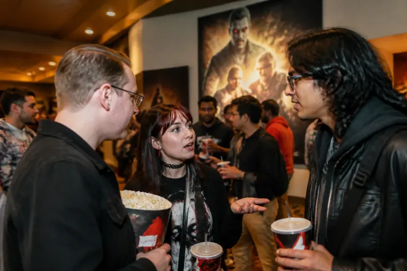 A gathering of fans at a movie screening for Resident Evil.