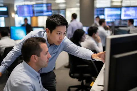 A busy crypto trading floor with traders analyzing the market.