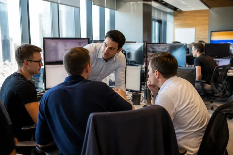 A bustling cryptocurrency exchange floor with traders engaged in conversation.