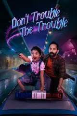 Poster for Don't Trouble the Trouble (2026) featuring Fahadh Faasil as a magician with magical elements swirling around him