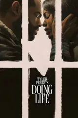Doing Life (2026) movie poster featuring Naomi Baker and Jay Reeves in a dramatic pose suggesting letter-writing connection across prison barriers