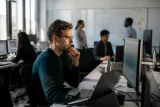 An AI agent monitoring permissions at a corporate workspace