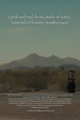 Poster for a pink and red dress, made of satin… covered in flowers, mostly roses (2026) showing a floral satin dress on a theatre stage