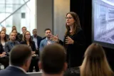 Booz Allen team presenting findings on AI security