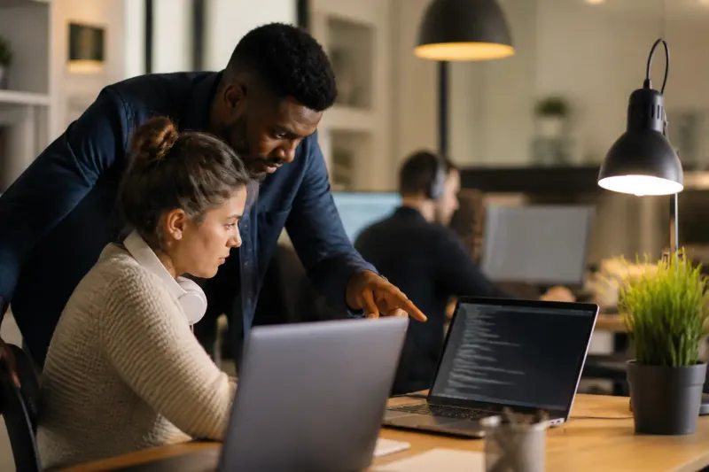 Cybersecurity team responding to vulnerabilities and patching.