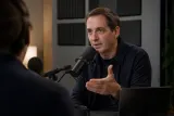 Kevin Roose speaking at a podcast event